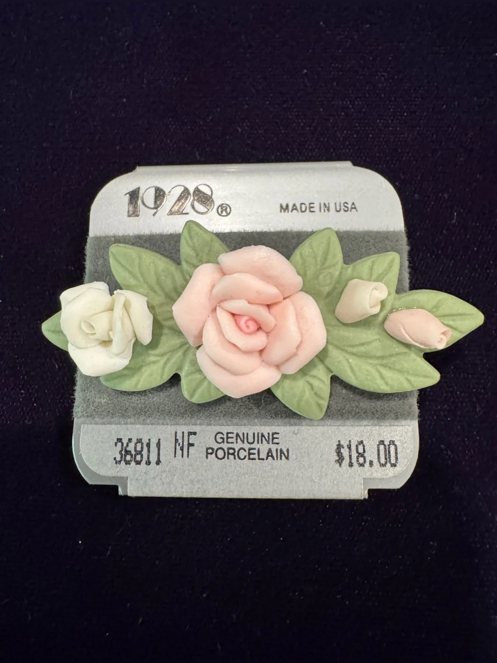 1928 Pale Pink and Cream Porcelain Rose Brooch with Green Leaves
